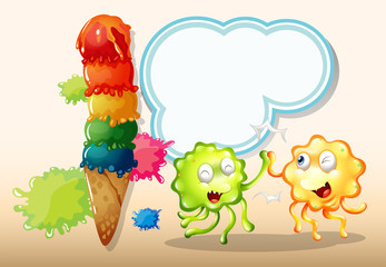A green and an orange monster playing near the giant icecream