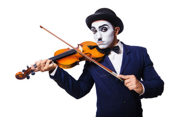 Man with face mask playing violin