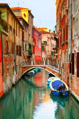 Fotobehang Narrow canal in Venice © Roman Sigaev
