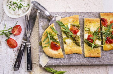 tarte flambee with mozzarella and arugula