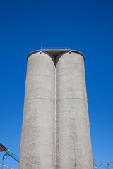 Large silos blue sky background