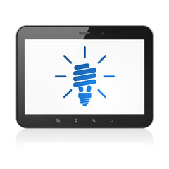 Business concept: Energy Saving Lamp on tablet pc computer