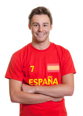Spanish soccer fan with crossed arms