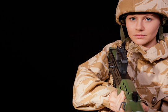Female Soldier With SA80 Rifle