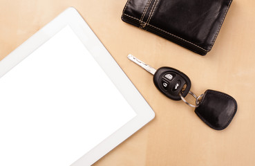 Tablet pc with empty space and a cup of coffee on a desk