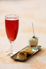 Kir royal coktail with amuse bouche