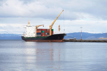 Naklejka premium Cargo container ship in the port