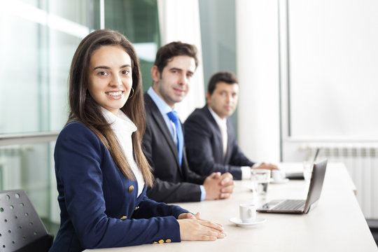 Business Team Smiling At The Office, Lined Up