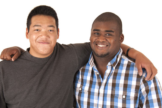 Black And Asian Brothers With Arms Around Each Other Smiling