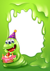 A green border design with a monster holding a cake