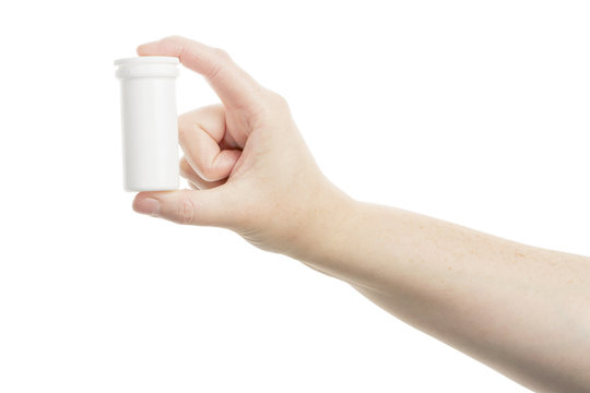 Hand Holding A Pill Bottle