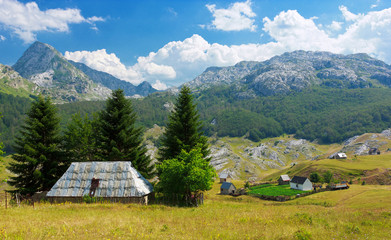 View of family farm on countriside near Rikavacko lake