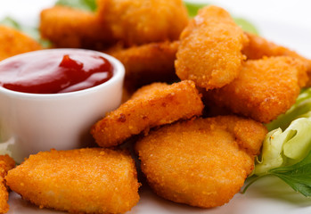 Chicken nuggets on white background