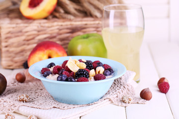 Oatmeal in plate with berries