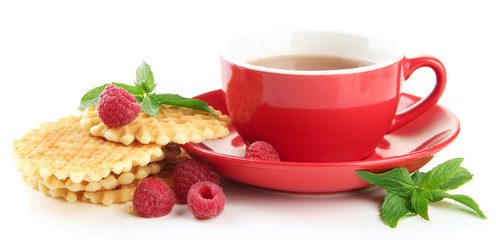 Cup of tea with cookies isolated on white