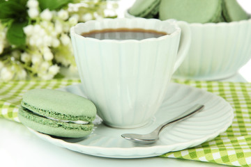 Coffee and macaroons close-up