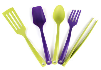 Plastic kitchen utensils isolated on white