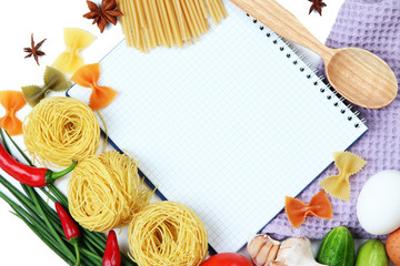 Cooking concept. Groceries with empty cookbook close up