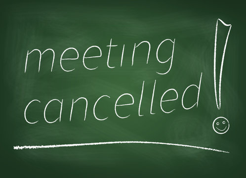 The chalkboard on which is written in chalk " Meeting cancelled"