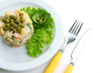 Russian traditional salad Olivier, isolated on white