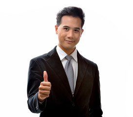 Smiling young businessman with thumb up