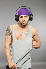 Casual man listening to music