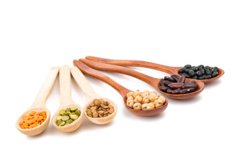 pulses in a wooden spoon isolated