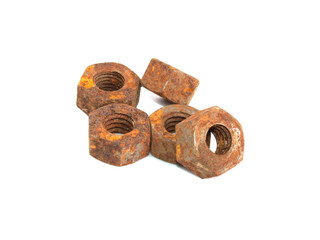 Rusty nuts and bolts on a white background.