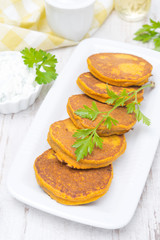 Pumpkin fritters with herbs, top view