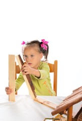 small girls in do handicraft