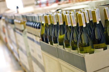 Red and white wine in bottles