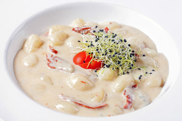 Delicious pasta on white plate