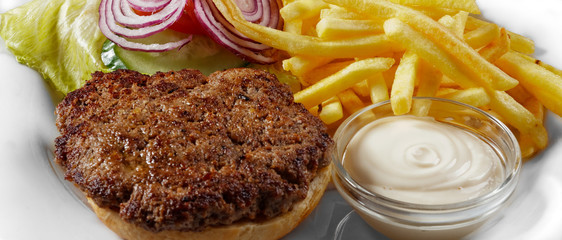 Delicious hamburger on white plate