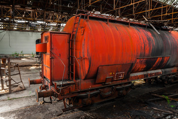 Fototapeta na wymiar Old oil transporter at depot