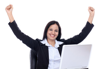 Successful business woman with arms up