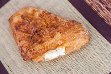puff pastry cheese pie on mat