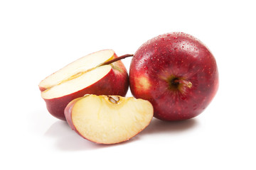 Several red apples on white background