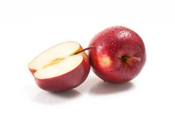 Several red apples on white background