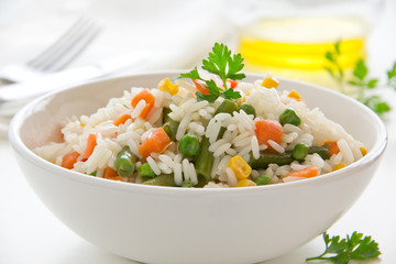 A plate of rice with vegetables. Selective focus.