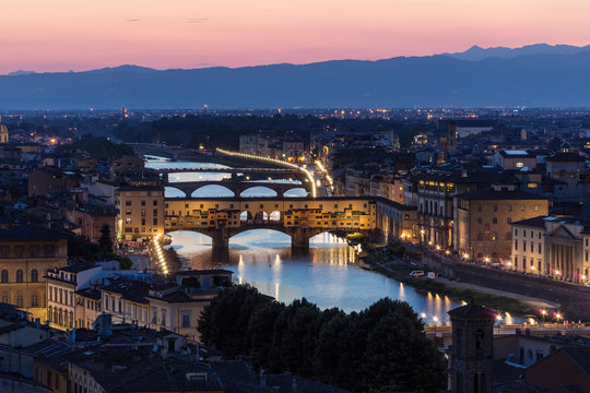 Arno river and Ponte Vecchio in Florence at night