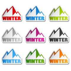 Vector symbol of mountains - sticker of winter