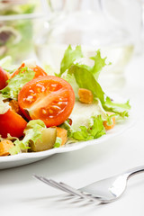 Closeup of salad. Lettuce, tomato, cucumber