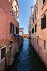 Fototapeta na wymiar The narrow canal - Venice, Italy