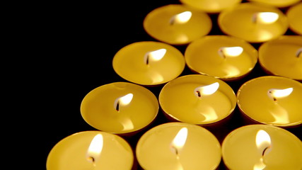 Candles background, tea light candle decoration dolly-shot