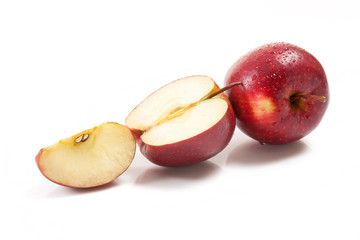 Several red apples on white background