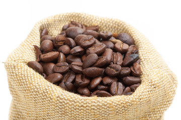 Fototapeta premium Coffee beans in burlap sack