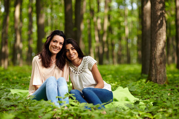 Mother and daughter at a picnic