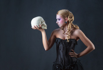 Girl in the role of Hamlet, studio shot