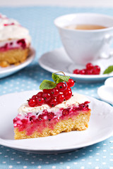 A piece of meringue red currant cake