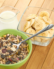 Delicious and healthy cereal in bowl with milk
